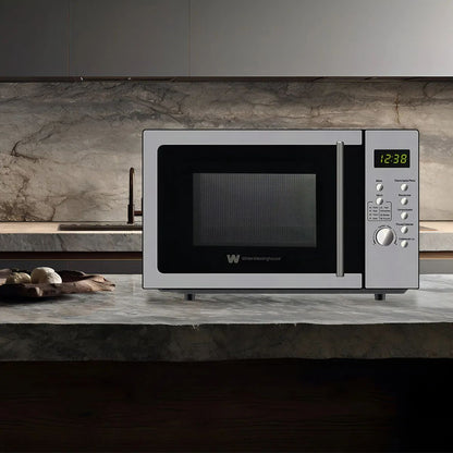 Horno de microondas color plateado, 1350 W, capacidad de 25 L y plato giratorio White Westinghouse